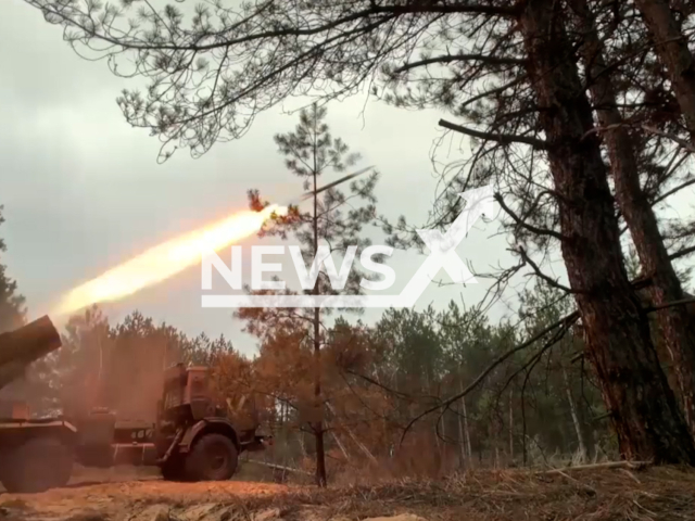 Russian BM-21 "Grad" fire rockets on Ukrainian positions in Ukraine in undated footage. The footage was released by Russian MoD on Sunday, Apr. 16, 2023.
Note: Picture is screenshot from a video. (@mod_russia/Newsflash)