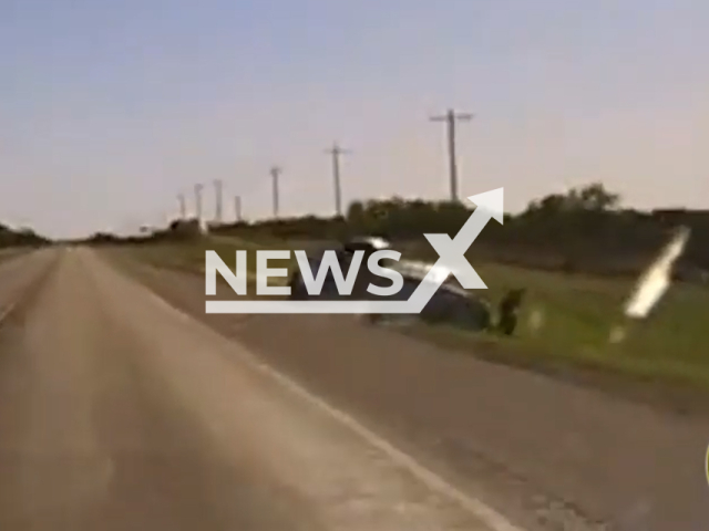 Human smuggler attempts to run over a DPS Trooper while trying to evade capture during a high-speed pursuit, in Zavala County, Texas, on Tuesday, March 24, 2023. The smuggler was charged with evading and aggravated assault on a public servant. Note: Picture is screenshot from a video. (@TxDeptPublicSafety/Newsflash)