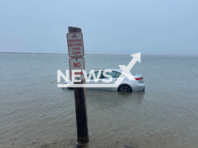 Image shows the car after it was soaked by a high tide, undated photo. The incident happened in the town of Duxbury, Massachusetts State, USA, in April 2023. Note: Licensed content. (Duxbury Police Department/Newsflash)