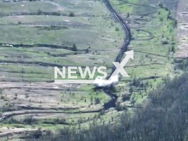 Ukrainian fighters destroy Russian BMP that tried to evacuate a damaged truck in Ukraine in undated footage. The footage was released by the 25th Separate Airborne Sicheslav Brigade on Tuesday, Apr. 18, 2023.
Note: Special Operations Forces Photo. (@dshv25opdbr/Newsflash)