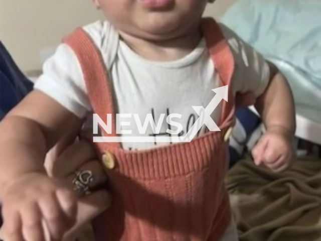 Image shows eight-month-old Rosalinda Martinez who was killed when her mum Ruby Marie Mora, 21, and dad Alejandro Martinez, 20, were wrestling for a handgun, undated photo. The incident happened in the city of San Antonio, Texas State, USA. Note: Private photo. (Newsflash)