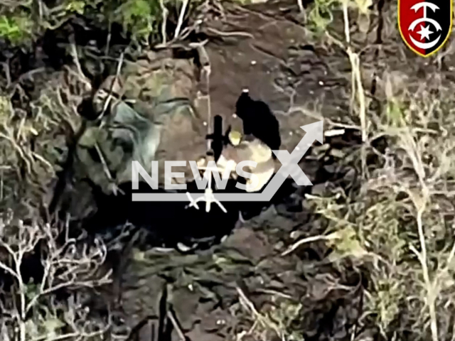 Russian soldiers fire with mortars before being hit by the Ukrainian artillery on the frontlines in Ukraine in undated footage. The footage was released by the 30th separate mechanized brigade on Wednesday, Apr. 19, 2023. Note: Picture is screenshot from a video. (@30brigade/Newsflash)