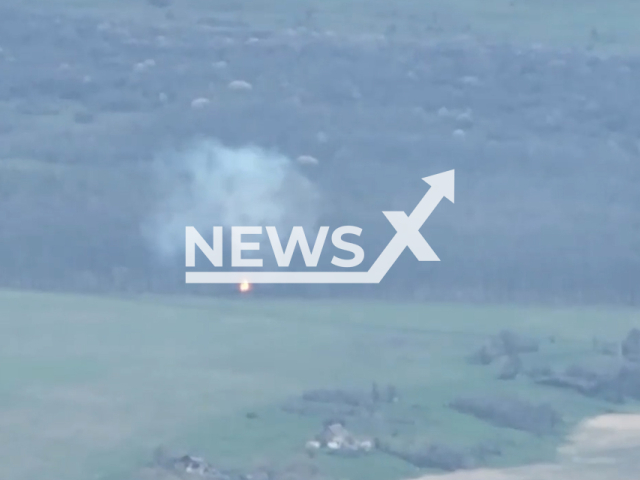 Ukrainian artillery destroys Russian self-propelled 203mm cannon "2S7" and military truck Near Bakhmut in Donetsk region in Ukraine in undated footage. The footage was released by the 30th separate mechanized brigade on Thursday, Apr. 20, 2023. Note: Picture is screenshot from a video. (@28mechanizedbrigade/Newsflash)