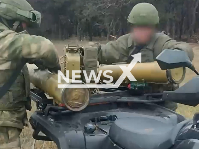 Russian soldiers load rockets on the Fagot anti-tank missile system in Ukraine in undated footage. The footage was released by Russian MoD on Friday, Apr. 21, 2023. Note: Picture is screenshot from a video. (@mod_russia/Newsflash)