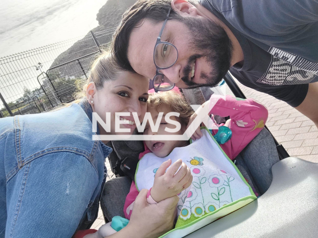 Picture shows Marta and her parents, undated. Marta who had a rare disease died. Note: Permission obtained for photo. (Newsflash)