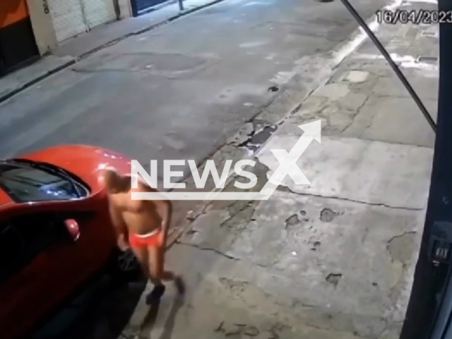 Picture shows a man   left only in underwear after street mugging, in Sau Paulo, Brazil, on Saturday, April 16, 2023
Police  reported that it was not called to the case.  Note: Picture is screenshot from a video. (Newsflash)