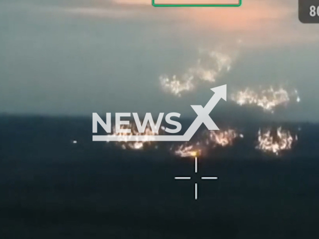 Russian artillery hits Ukrainian military positions with incendiary ammunition near Avdiivka in Ukraine in undated footage. The footage was released by the People's Militia of the DPR on Monday, Apr. 24, 2023.Note: Picture is screenshot from a video. (@nm_dnr/Newsflash)