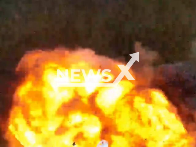 Picture shows huge explosion after Ukrainian paratroopers hit Russian military equipment with attack drones in Ukraine in undated footage. The footage was released by 79th separate amphibious assault brigade on Tuesday, Apr. 25, 2023. Note: Picture is a screenshot from a video (@79AMBUA/Newsflash)