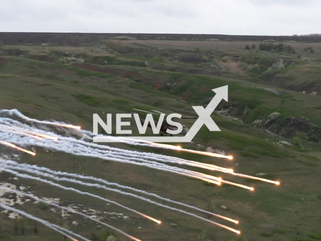 Russian Mi-35 multi-purpose attack helicopters fire missiles at Ukrainian military positions in Ukraine in undated footage. The footage was released by Russian MoD on Tuesday, Apr. 25, 2023. Note: Picture is a screenshot from a video (Ministry of Defense of Russia/Newsflash)