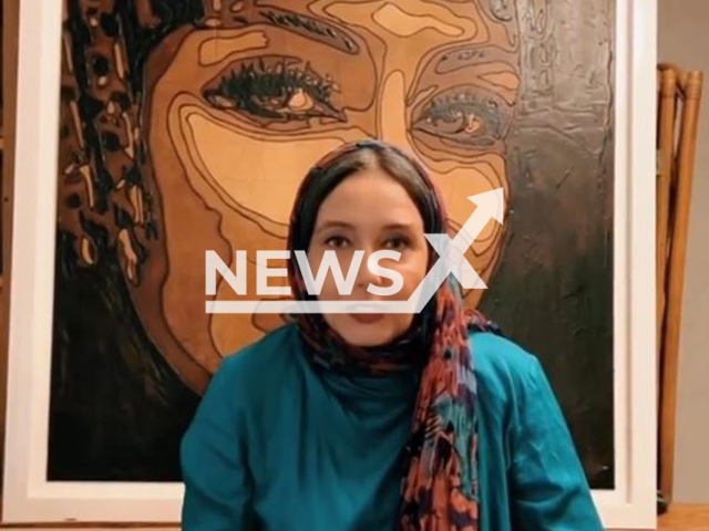 Iranian actress Katayoun Riahi, poses in undated photo. The Tehran Police Information Center announced the filing of a legal case against Ketayoun Riahi and Panthea Bahram due to the removal of the mandatory  hijab.

 Note: Photo is a screenshot from a video. (@katayounriahiofficial7/Newsflash)