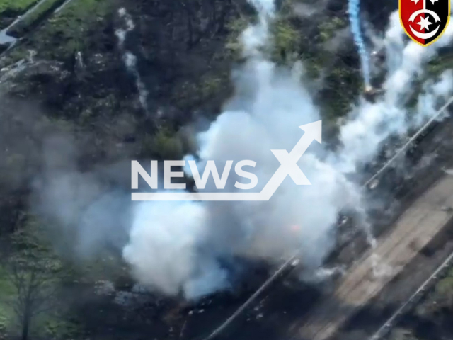 Ukrainian artillery destroys Russian military positions near Bakhmut in Ukraine in undated footage. The footage was released by the 30th separate mechanized brigade on Wednesday, Apr. 26, 2023. Note: Picture is a screenshot from a video (@30brigade/Newsflash)