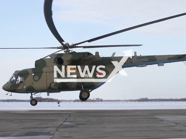 Russian paratroopers made protracted parachutes jump from a height of 3000 meters and formed the letters V and Z in the sky of Samara, Russia. Note: Picture is a screenshot from a video (Ministry of Defense of Russia/Newsflash)