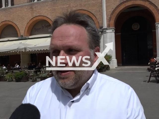 Restaurant owner Luca Marton poses in undated photo. He hired robots for table service in the city of Treviso, Italy. Note: Photo is a screenshot from a video. (Newsflash)