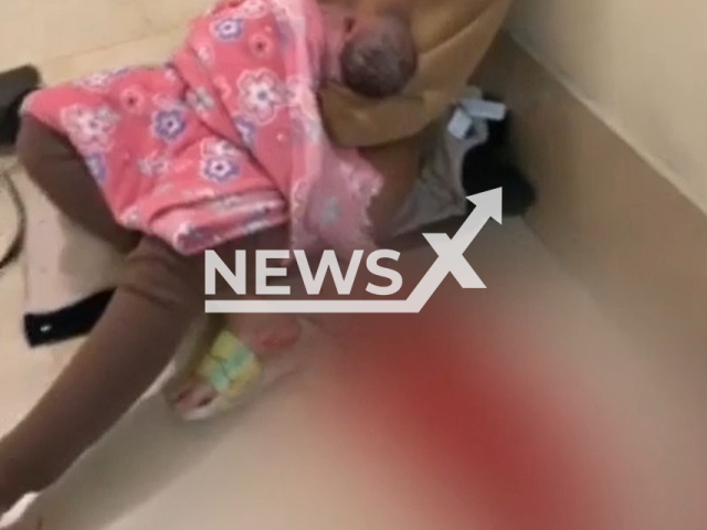 Picture shows  Nerea Sanchez, 25, and her newborn Keyla, after the delivery in Bilbao, Spain, on January 4,  2023. She was discharged from the hospital while in labour  and gave birth in the entrance of her building. 
 Note: Photo is a screenshot from a video. (Newsflash)