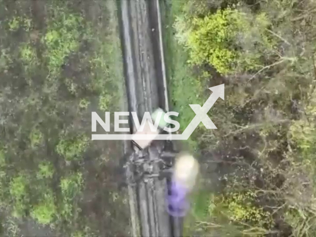 Ukrainian fighters drop bombs on Russian military vehicle in Ukraine in undated footage. The footage was released by 72nd of the separate mechanized brigade on Thursday, May. 4, 2023.
Note: Picture is a screenshot from a video (@72.brigade.best/Newsflash)