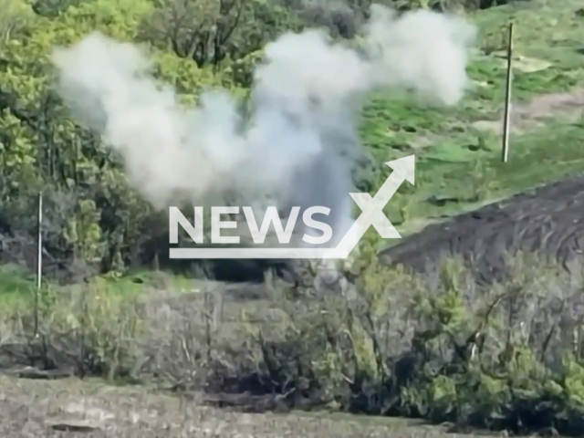 Ukrainian fighters destroy Russian mortar calculation on the frontlines in Ukraine in undated footage. The footage was released by 66th Separate Mechanized Brigade on Sunday, May. 7, 2023. Note: Picture is screenshot from a video. (@66ombr/Newsflash)