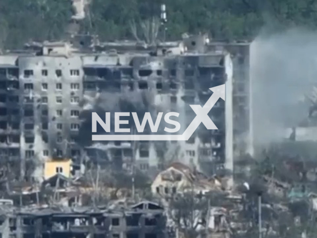 Ukrainian fighters destroy Russian machine gun calculation positioned in the high-rise building in Bakhmut in Ukraine in undated footage. The footage was released by the 8th special purpose regiment of the SSO on Monday, May. 8, 2023. Note: Picture is a screenshot from a video (@8regimentUkraine/Newsflash)