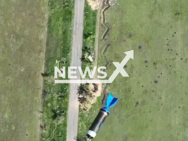 Ukrainian drones drop bombs at Russian military trenches from 250 meters altitude in the frontlines in Ukraine in undated footage. The footage was released by Donetsk separate brigade of the Territorial Defense Forces on Tuesday, May. 9, 2023. Note: Picture is a screenshot from a video (@donobrtro/Newsflash)