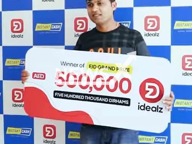 The Nepali man Shambhu Kumar Mahto wins  Dh500,000 (GBP107,859) cash in a collaborative raffle draw campaign in Abu Dhabi, UAE, undated. He will invest this money to secure his children’s future. Note: Photo is a screenshot of a video. (@idealzworld/Newsflash)