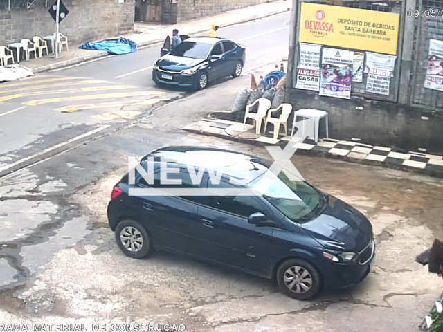 Two armed men try to kidnap another man in Camacari, Bahia, Brazil, Tuesday, May 9, 2023. Despite being pushed into the car, the victim escaped and ran away. Note: Picture is a screenshot from a video (Newsflash)