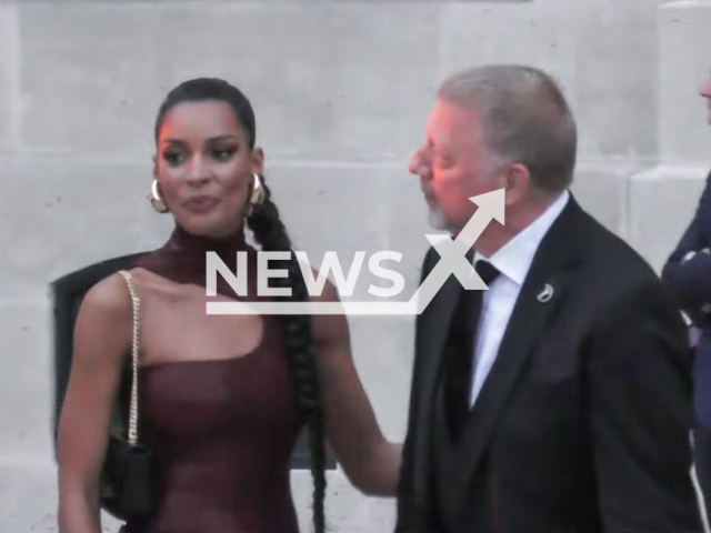 Image shows Boris Becker, and his girlfriend Lilian de Carvalho Monteiro at the Laureus awards in the city of Paris, France, on May 8, 2023. They reportedly moved to the city of Milan, Italy. Note: Photo is a screenshot from a video. (Newsflash)