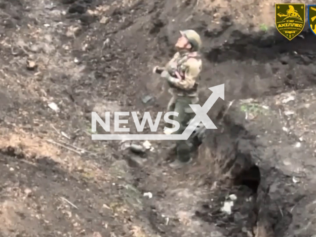 A Russian soldier surrenders to Ukrainian troops after receiving a note from a drone asking him to surrender in the tranches near Bakhmut in Ukraine on Tuesday, May, 9, 2023. The official stressed that being captured in Ukraine gives a better chance of survival than serving in the Russian army. Note: Picture is a screenshot from a video (@92OMBr/Newsflash)