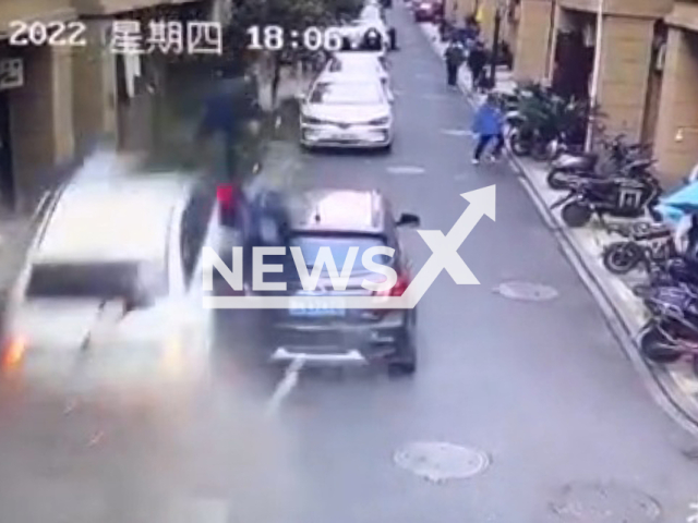 Car drives into sidewalk killing one and injuring two in Hangzhou, China, on 24th March 2022. Note: Picture is a screenshot from a video (AsiaWire)