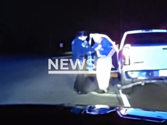 Elderly man teaches Officer Woodmansee how to clog dance during a traffic stop, in Pickens, South Carolina, on Sunday, May 7, 2023. Note: Picture is a screenshot from a video (Pickens Police Department/Newsflash)