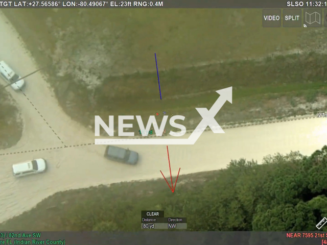 The officers chasing a suspect after he flees from the St. Lucie County Sheriff's Office during a traffic stop in Indian River County, USA on Friday, March 25, 2022. Note: Picture is a screenshot from a video (IRCSheriff/Newsflash)