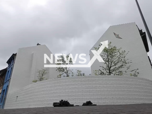 Picture shows the memorial garden in place of Marc Dutroux's   house in Marcinelle, Belgium, undated.  The site is where his victims  Melissa Russo, 8,  and Julie Lejeune, 8, had been held when he kidnaped them.   
 
 Note: Photo is a screenshot from a video. (Newsflash)