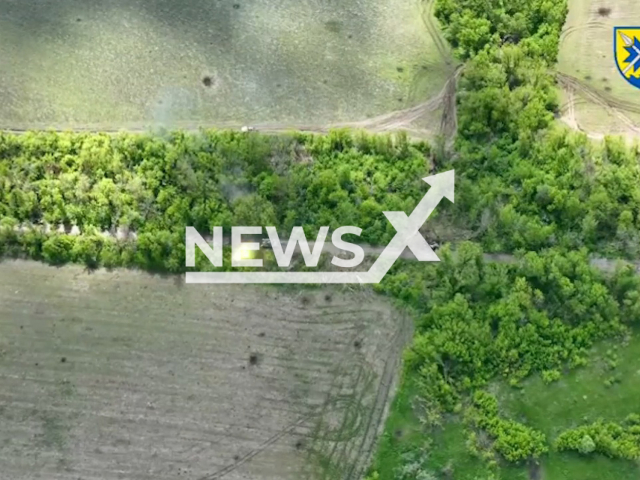 Ukrainian tank fire at the Russian positions in the trenches in Ukraine in undated footage. The footage was released by 56th separate Mariupol motorized infantry brigade on Saturday, May, 13, 2023. Note: Picture is a screenshot from a video (56th separate Mariupol motorized infantry brigade/Newsflash)