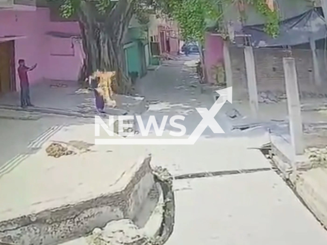 A woman sets herself on fire while her brother films her in Shahjahanpur, India, undated. She was allegedly persuaded by her brother to set herself on fire allegedly after their parents were taken to the police station following a quarrel with the neighbours. Note: Picture is screenshot from a video. (Newsflash)