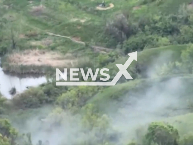 Ukrainian fighters successfully neutralized a Russian mortar position at the frontline in Ukraine in undated footage. The footage was released by the 26th Artillery Brigade on Monday, Maj, 15, 2023. Note: Picture is screenshot from a video. (@26abr/Newsflash)