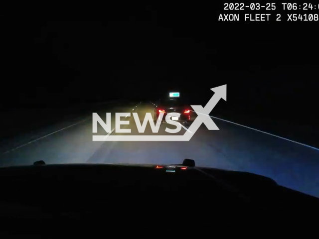 The officers arresting the suspect after a 120 mph chase in Forsyth County, Georgia, USA. Note: Picture is a screenshot from a video (@ForsythCountySO/Newsflash)