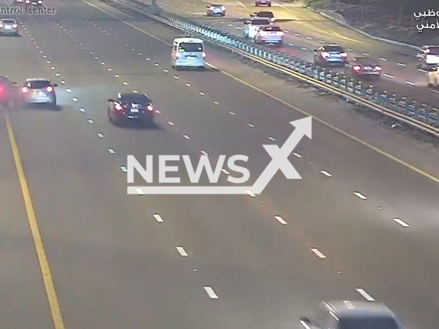 Photo shows a car tailgating another on a four-lane highway in UAE, undated. Police said drivers will be fined. Note: Picture is screenshot from a video. (Abu Dhabi Police/Newsflash)