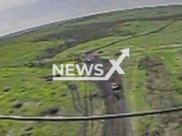 Ukrainian Kamikaze drone crashes into Russian T-80BV tank in Ukraine in undated footage. The footage was released by K2 group of the 54th OMBr on Wednesday, May, 17, 2023. Note: Picture is a screenshot from a video (@K2.54OMBr/Newsflash)