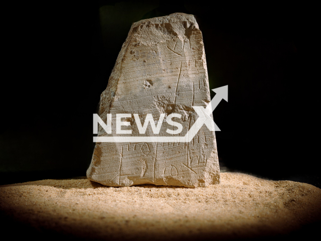 Photo shows a small stone tablet engraved with letters and numbers, believed to be a 2000-year-old financial record, undated. It was discovered on the Pilgrimage Road in the City of David, Jerusalem, Israel. Note: Licensed photo (Eliyahu Yanai, City of David/Newsflash)