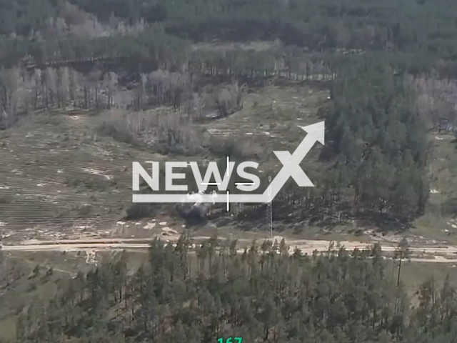 Russian paratroopers destroy Ukrainian stronghold with heavy fire from BMD-4M in the frontlines in Ukraine in undated footage. The footage was released by Russian MoD on Wednesday, May, 17, 2023.
Note: This picture is a screenshot from the video.
(Ministry of Defense of Russia/Newsflash)