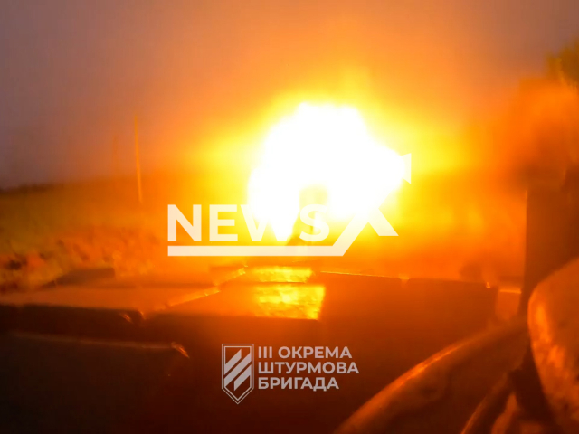 Ukrainian tank fire at Russian ammunition depot near Bakhmut in Ukraine in undated footage. The footage was released by 3rd separate assault brigade on Wednesday, May, 17, 2023.
Note: This picture is a screenshot from the video. (@ab3.army/Newsflash)