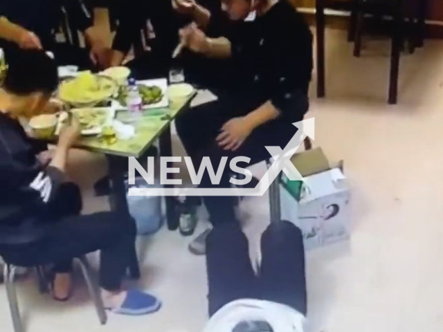 Mother falls on the floor when baby in walker moves her chair in Qingdao, China. Note: This picture is a screenshot from the video (98701629/AsiaWire).