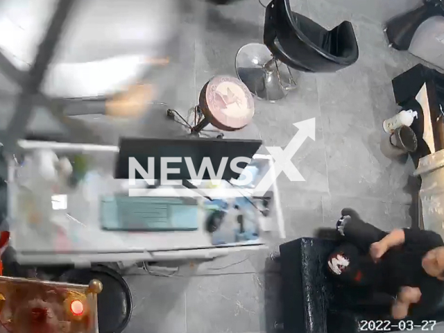 Car crashes into barber shop in Quanzhou, China, on 27th March 2022. Note: Picture is a screenshot from a video (yg5200712/AsiaWire)