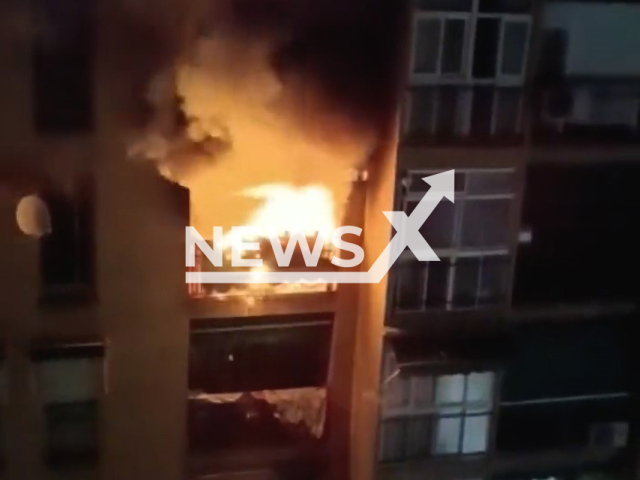 Apartment burns on Circunvalación Encina Street, in Granada, Spain, on Monday, May 15, 2023. A six-year-old boy died in the accident while the mother is seriously injured.  Note: Picture is screenshot from a video. (@PoliciaGr/Newsflash)