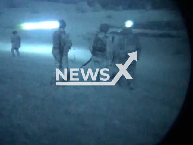 Ukrainian fighters equip night vision gadgets preparing for night battles in Ukraine in undated footage. The footage was released by Separate brigade of territorial defense of the city of Dnipro on Wednesday, May, 18, 2023. Note: Picture is a screenshot from a video (@BrTODnipro/Newsflash)