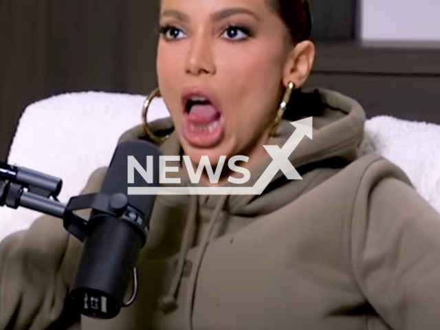 Photo shows the singer Anitta moving her tongue up and down during the Call Her Daddy interview, undated. Anitta is a Brazilian singer, songwriter, television host, and actress. Note: Picture is a screenshot from a video (Newsflash)