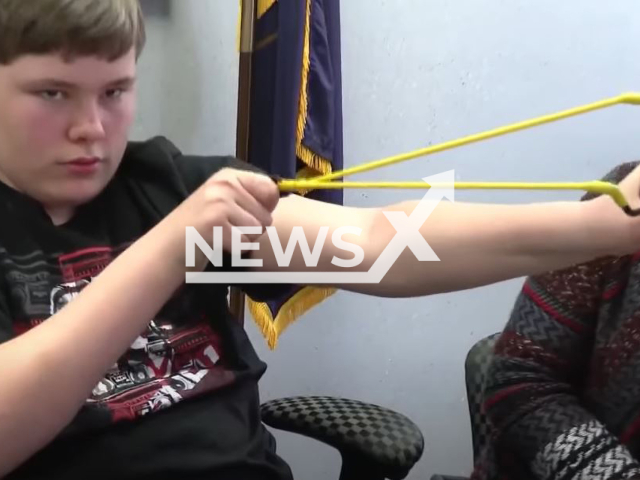 Picture shows Owen Burns, 13, with his slingshot, undated. He stopped the alleged   kidnapping of his 8-year-old sister using his  slingshot in  Alpena Township, Michigan, USA, on Wednesday,  May 10, 2023.
 
 Note: Photo is a screenshot from a video. (Newsflash)