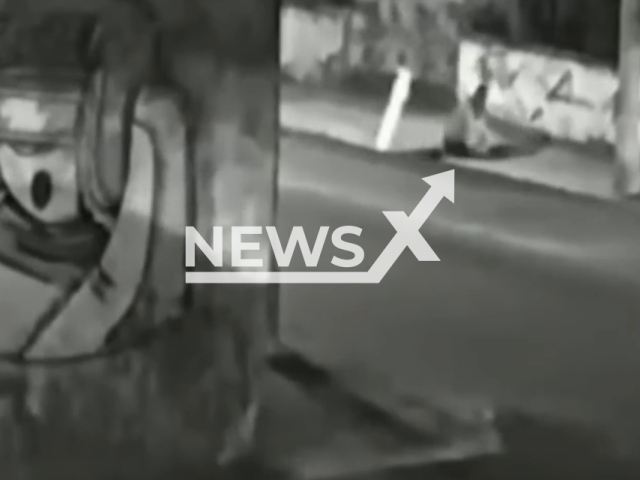 Brothers  Jeanpierri Soares da Silva and Alexander Soares da Silva fall into sinkhole walking on sidewalk in Rio de Janeiro, Brazil, on April 24, 2023. Then they were rescued by a group of motorcycle taxi drivers, and  suffered abrasions  and dislocations. Note: Picture is a screenshot from a video (Newsflash)