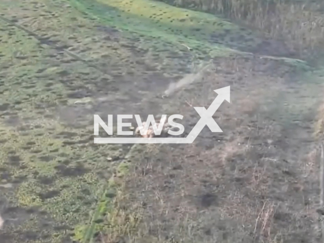 Ukrainian fighters destroy Russian armoured fighting vehicles on the frontlines in Ukraine in undated footage. The footage was released by 10th separate mountain assault brigade on Sunday, May, 21, 2023. Note: Picture is a screenshot from a video (10th Mountain Assault Brigade/Newsflash)