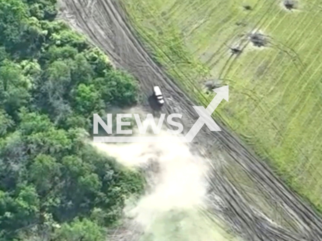 Ukrainian fighters destroy Russian military truck on the battlefield in Ukraine in undated footage. The footage was released by 25th Separate Airborne Sicheslav Brigade on Saturday, May, 20, 2023. Note: Picture is a screenshot from a video (@dshv25opdbr/Newsflash)