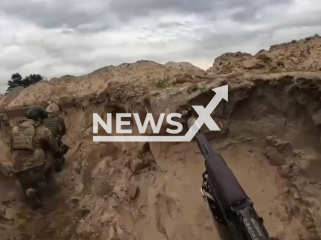 Picture shows soldiers of the Buchansk Territorial Defense Battalion with guns during combat training in Kyiv region, Ukraine, undated. The footage was released by the 114th Territorial Defense Brigade of the Kyiv region on Tuesday, May, 23, 2023. Note: This picture is a screenshot from the video. (114th brigade/Newsflash)