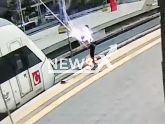 Photo shows a man who was electrocuted but survived while cleaning train windows in Istanbul, Turkey, Tuesday, May 23, 2023. The man reportedly remains at the hospital. Note: Picture is a screenshot from a video (Newsflash)